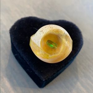 Yellow glass ring with opal inside. Brand new!